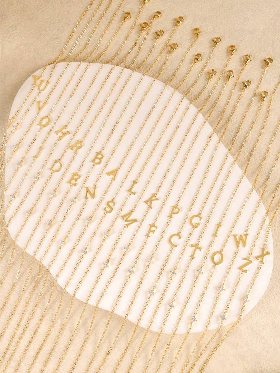 Leonie original initial necklace overview — select one available letter