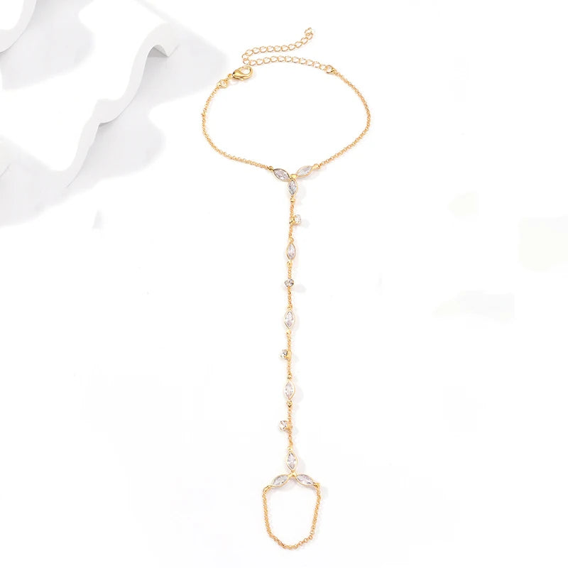 ElaraDrop Zircon Finger Chain Bracelet – Stainless Steel Hand Jewellery | Water Droplet Charm | Minimalist Women’s Statement Bracelet