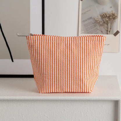 Solena Striped Woven Clutch Bag – Women’s Crochet-Style Beach Handbag | Soft Knitted Dumpling Purse | Casual Summer Clutch