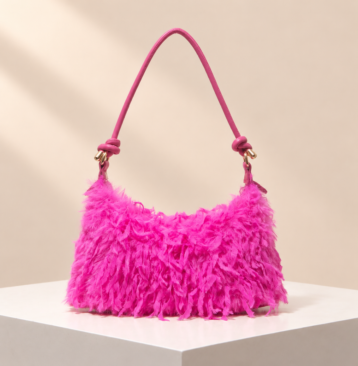 Evelisse Fringe Shoulder Bag — warm beige studio background