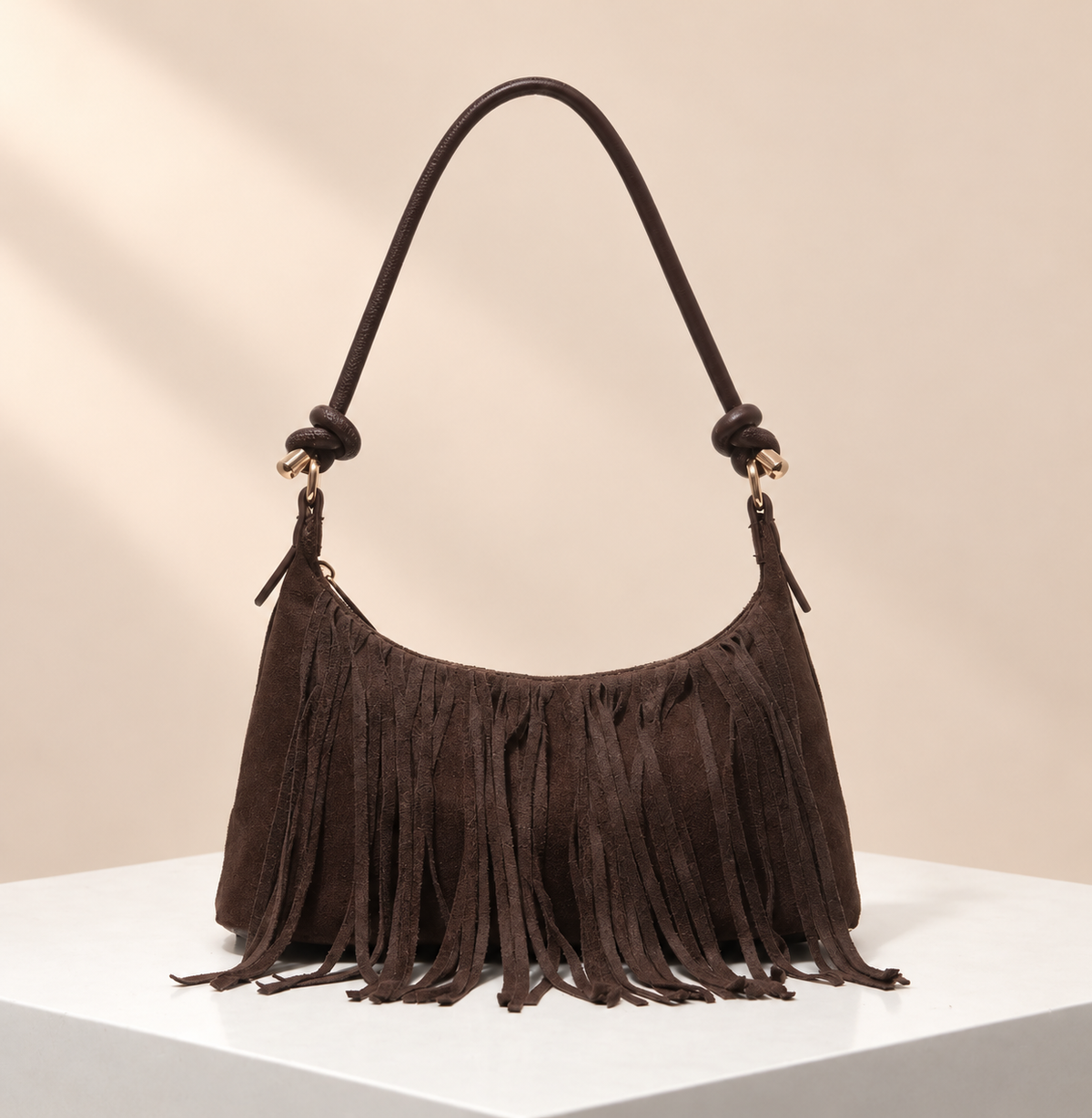 Marvelle Fringe Shoulder Bag — warm beige studio background