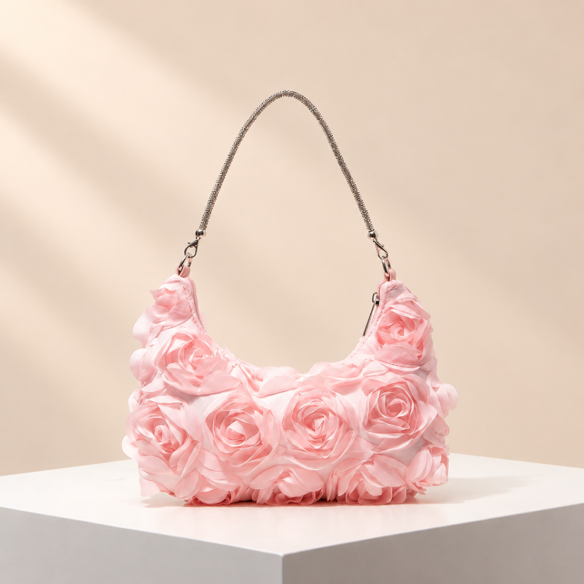 Roselisse Rosette Shoulder Bag — warm beige studio background