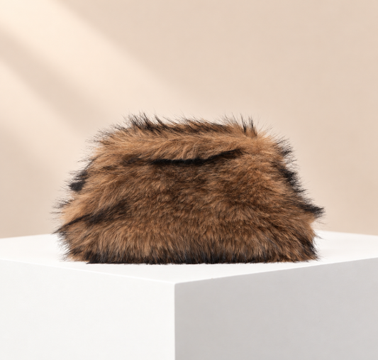 Aurevane Textured Occasion Clutch — warm beige studio background