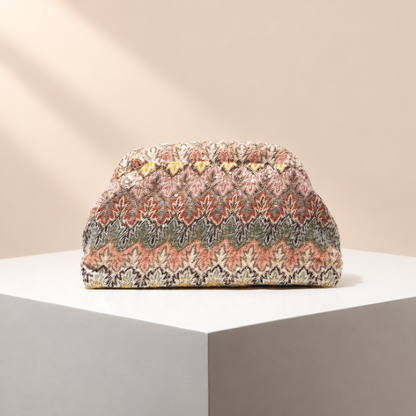 Fioravelle Patterned Occasion Clutch — warm beige studio background