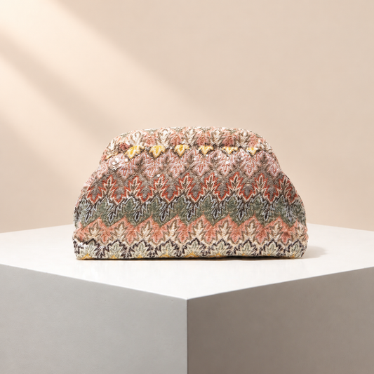 Fioravelle Patterned Occasion Clutch — warm beige studio background