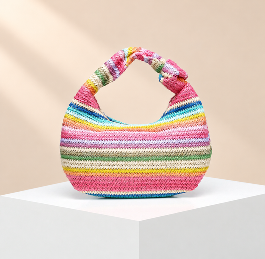 Calienne Striped Knit-Effect Hobo Bag — warm beige studio background