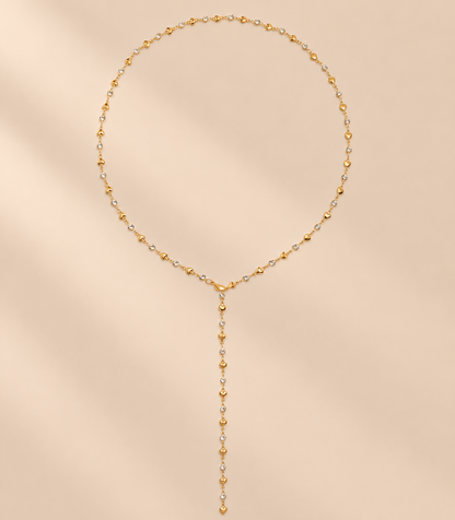 Amorielle Rhinestone Heart Necklace — warm beige studio background