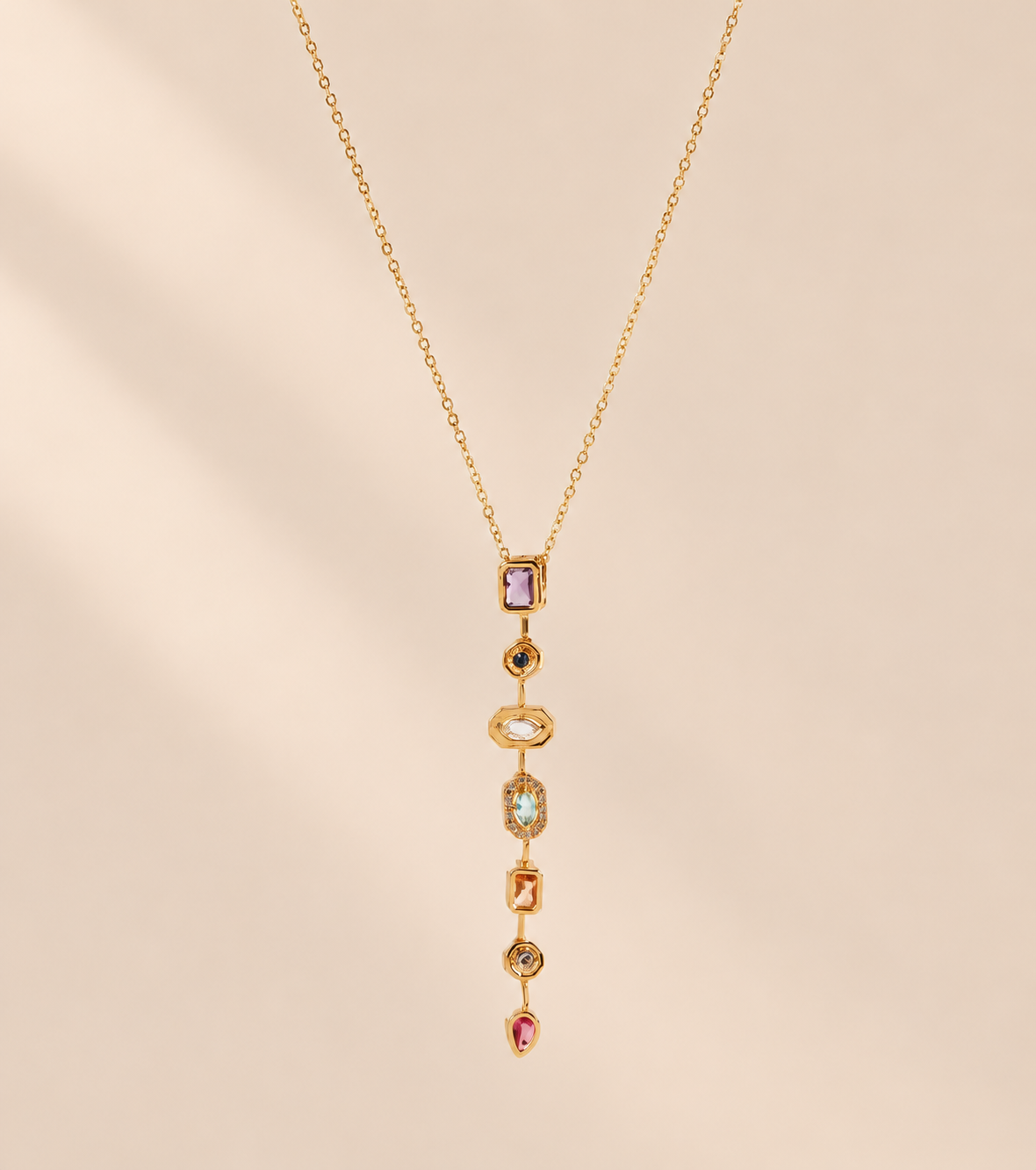Virelia Multicolour Rhinestone Pendant Necklace — warm beige studio background