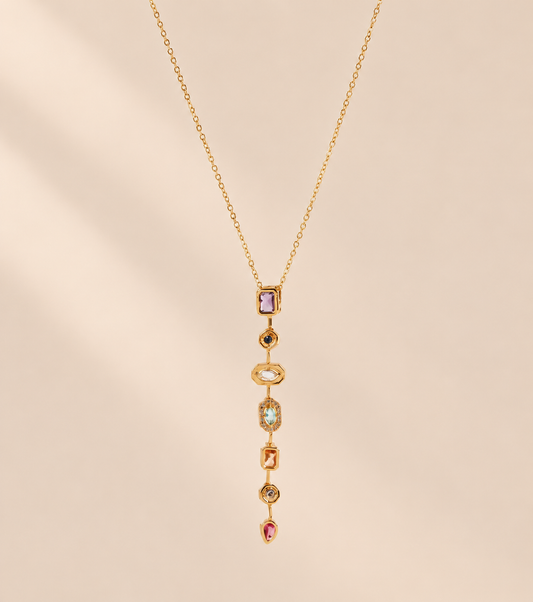 Virelia Multicolour Rhinestone Pendant Necklace — warm beige studio background
