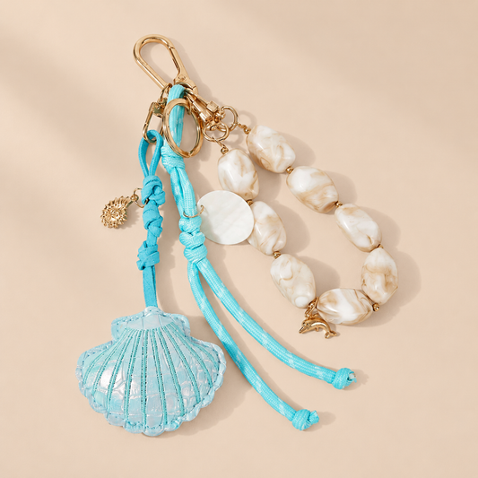 Mariselle Ocean Charm Keychain — warm beige studio background