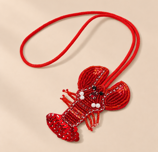 Melonelle Beaded Bag Charm — warm beige studio background