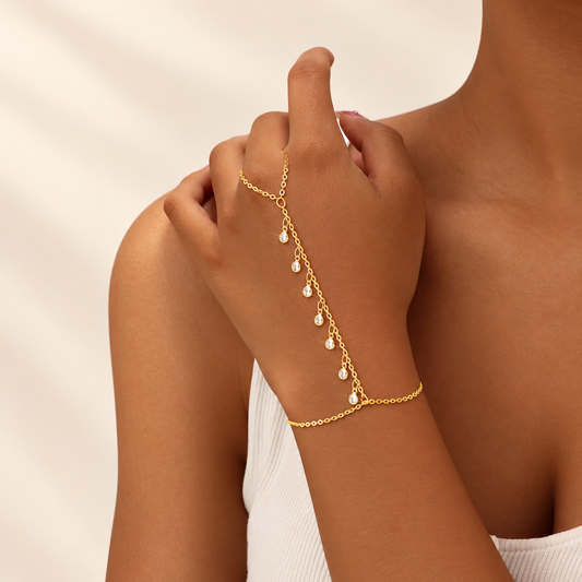 AureliaTassel Geometric Finger Chain Bracelet — ivory studio product photograph