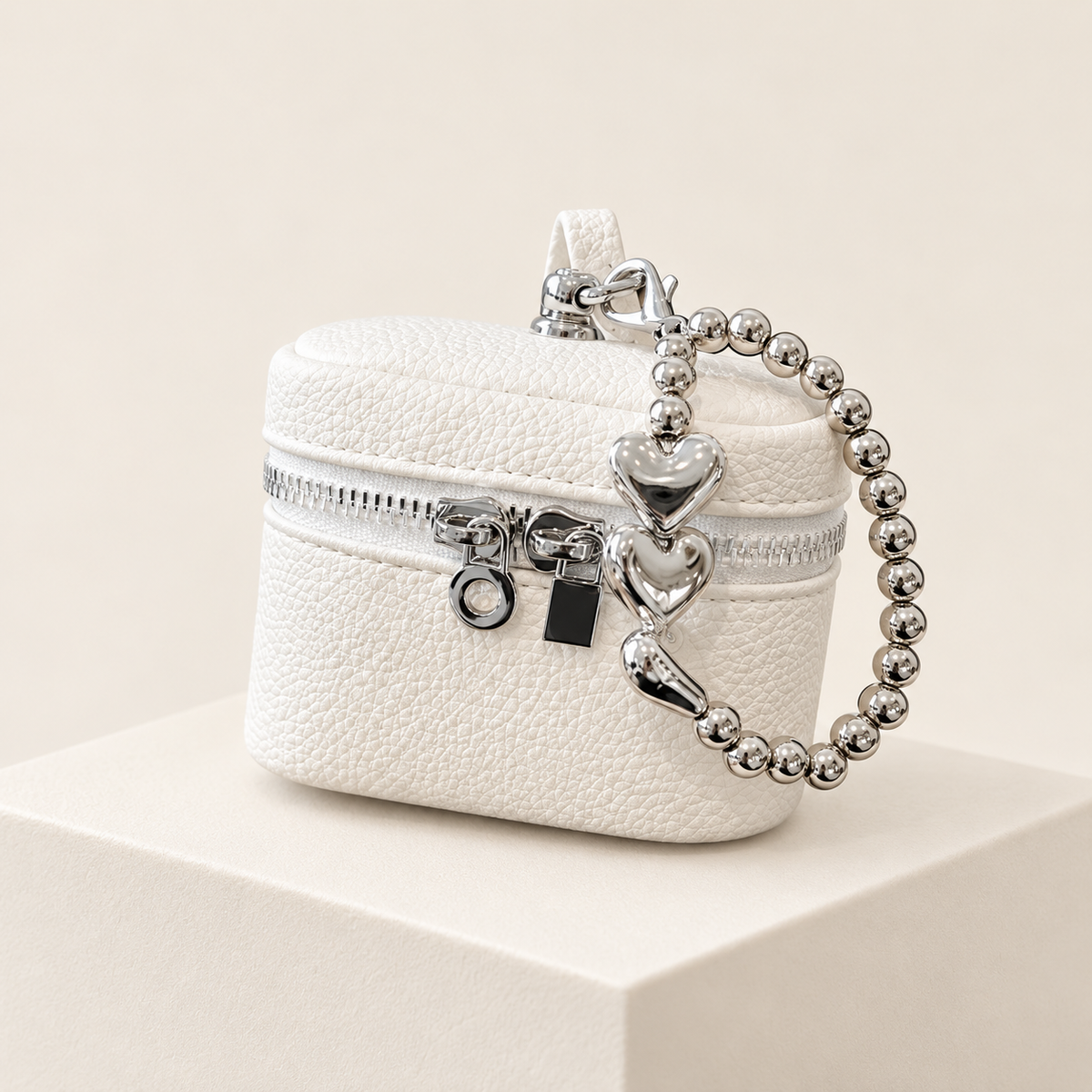 Mini Headphone Case — Whitee — ivory studio photograph