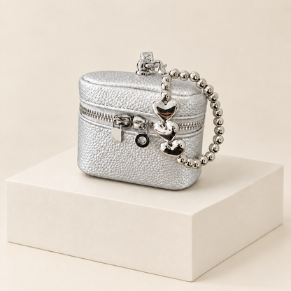 Mini Headphone Case — Silver — ivory studio photograph