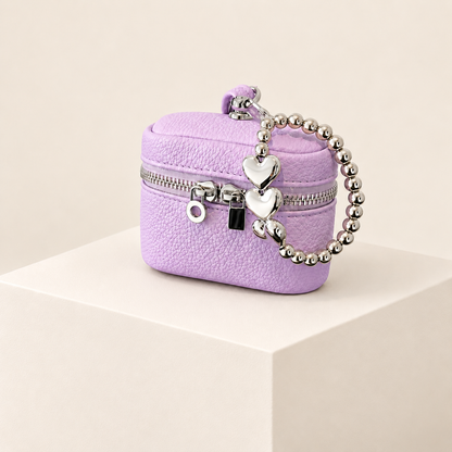 Mini Headphone Case — Purple — ivory studio photograph