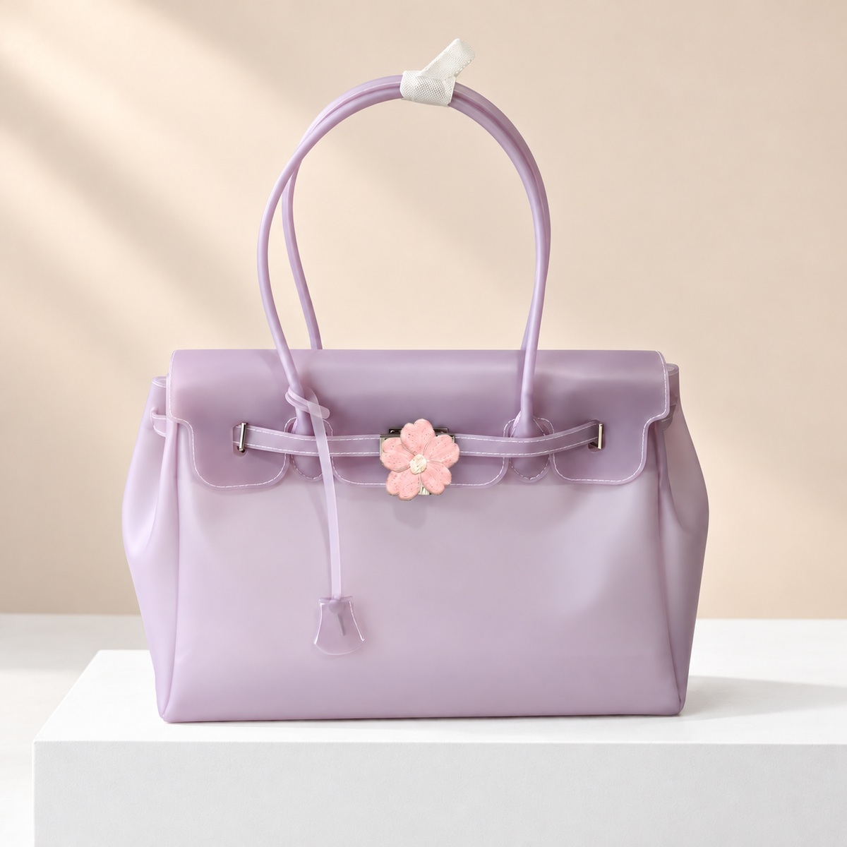 Celestia Lightweight Jelly Tote Bag — white plinth, warm beige background