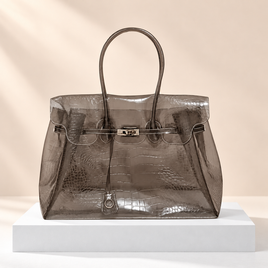 Crocelle Crocodile-Effect Jelly Tote Bag — white plinth, warm beige background