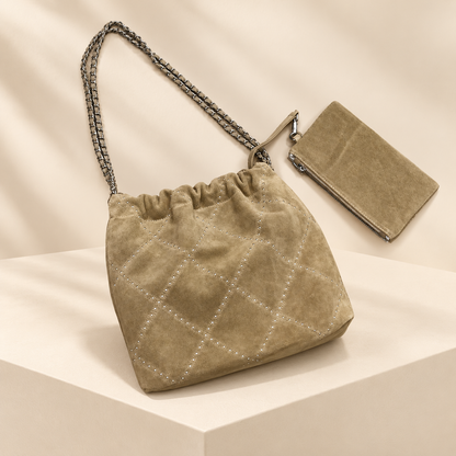 Seravelle Suede Diamond Bucket Bag — ivory studio gallery photograph