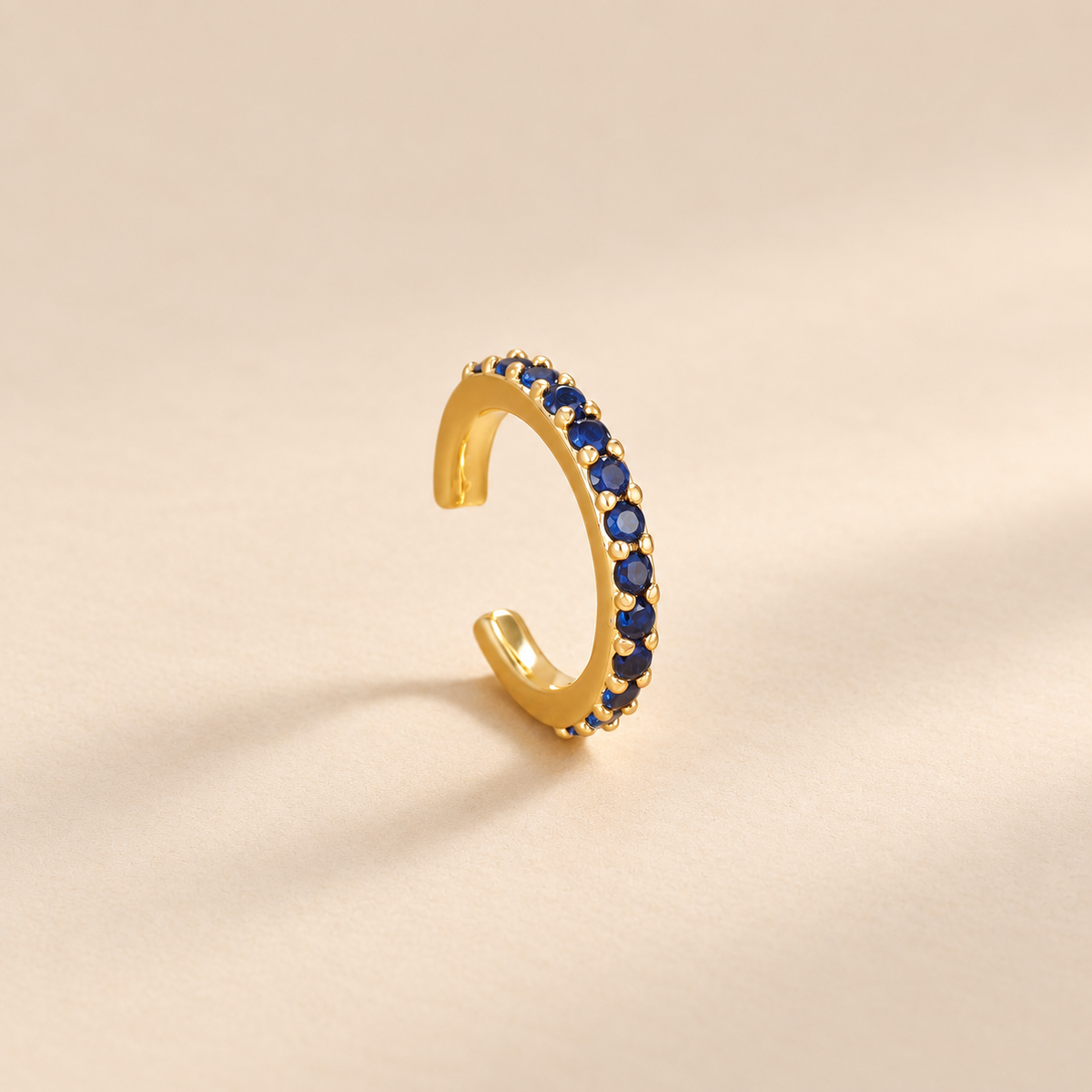 Orlienne Cubic Zirconia Ear Cuff — ivory studio gallery photograph