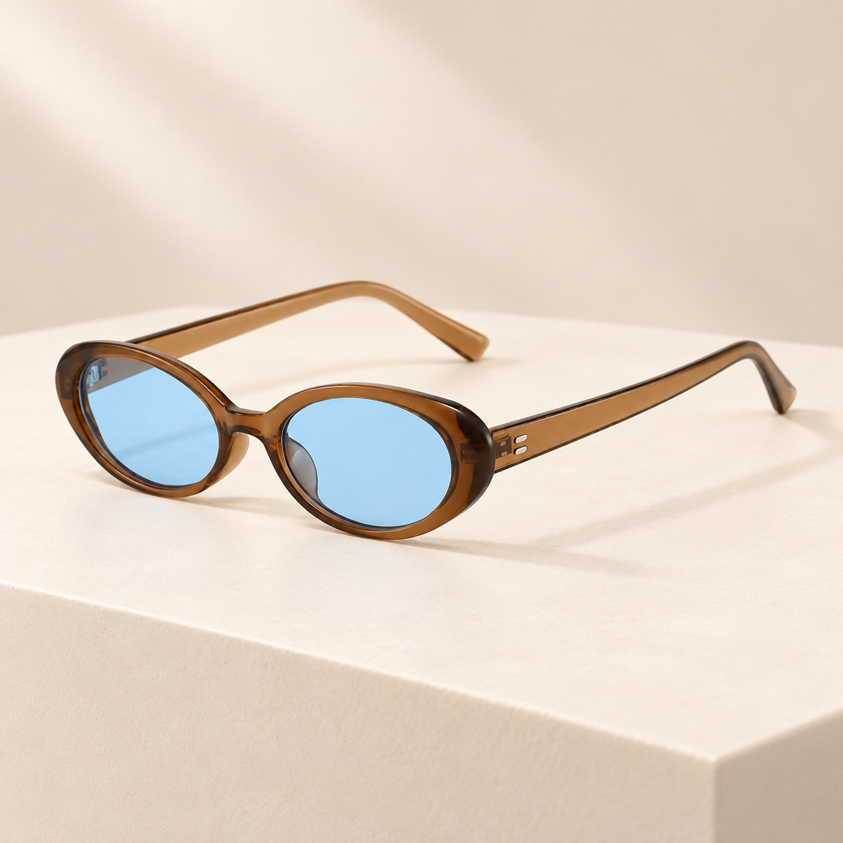 Viretta Retro Oval Sunglasses — ivory studio product photograph