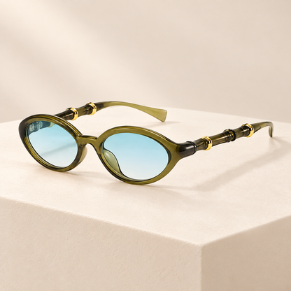 Rivelle Retro Rivet Oval Sunglasses — ivory studio product photograph