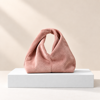 Virelisse Fuzzy Suedette Mini Handbag — white plinth, warm beige background