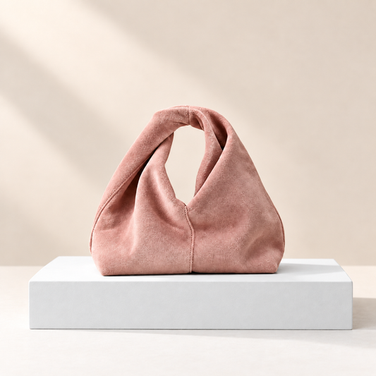 Virelisse Fuzzy Suedette Mini Handbag — white plinth, warm beige background