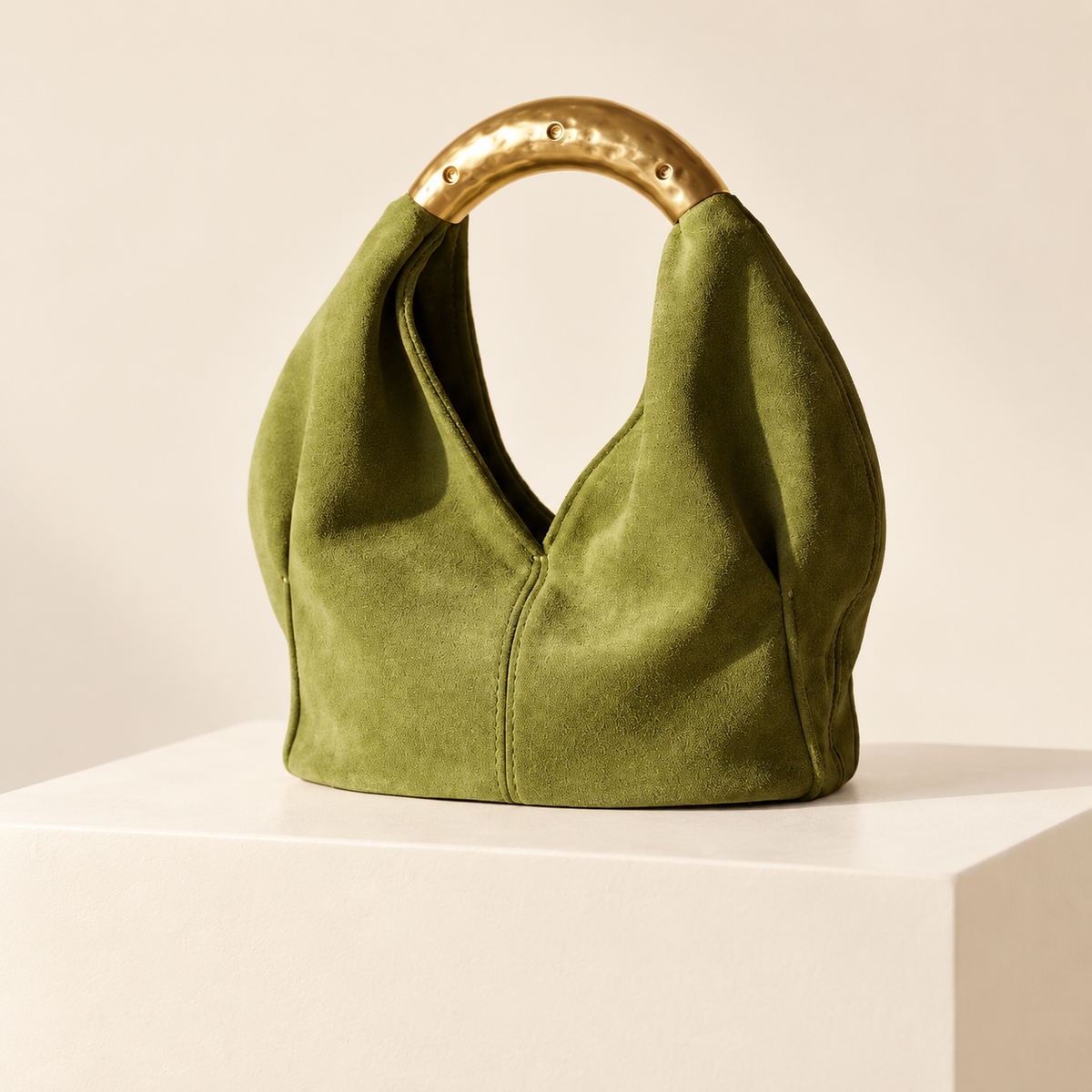 Avelisse Metal Handle Mini Bag — ivory studio gallery photograph