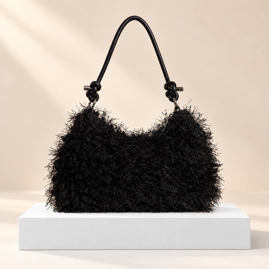 Noirelle Fluffy Shoulder Bag — white plinth, warm beige background