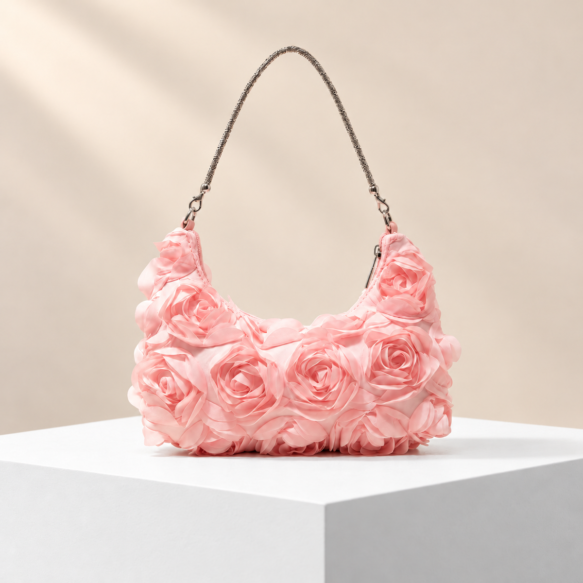Rosavelle Rosette Shoulder Bag — white plinth, warm beige background