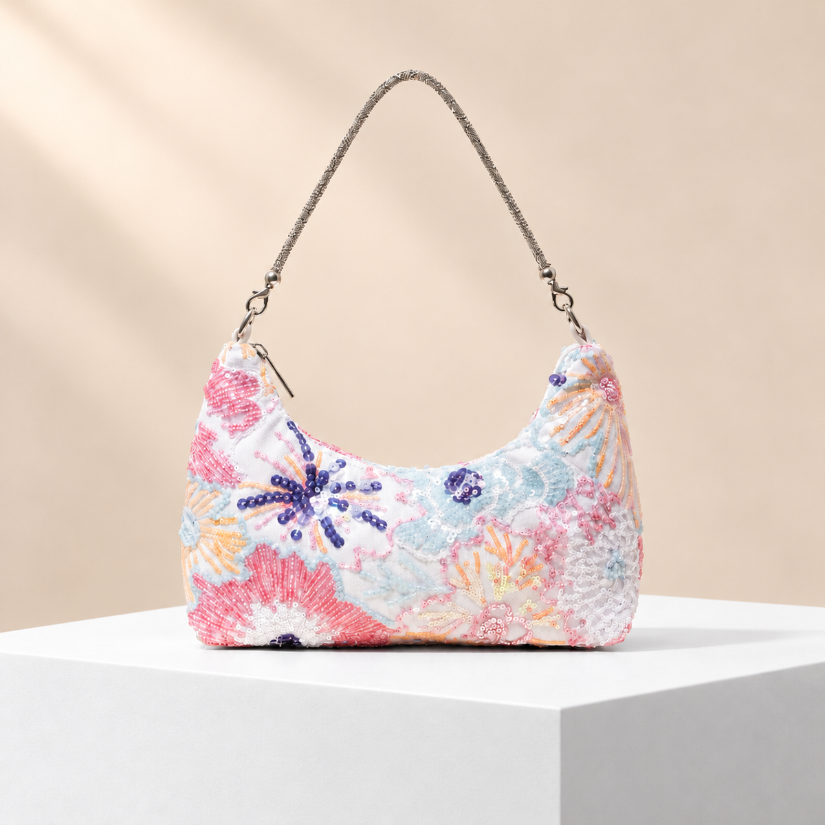 Prismelle Floral Embellished Shoulder Bag — white plinth, warm beige background
