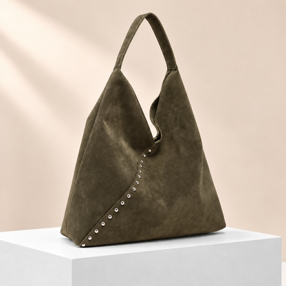 Rivelle Studded Suedette Hobo Bag — white plinth, warm beige background