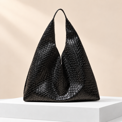 Geovelle Woven-Effect Shoulder Tote — white plinth, warm beige background