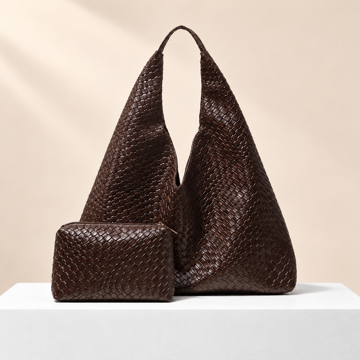 Viremont Woven-Effect Shoulder Tote — white plinth, warm beige background