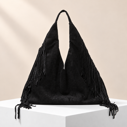 Aurevine Fringe Shoulder Tote — white plinth, warm beige background