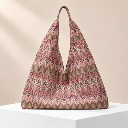 Mirevane Patterned Shoulder Tote — white plinth, warm beige background