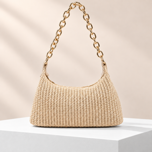 Aurelia Chain Shoulder Bag — white plinth, warm beige background