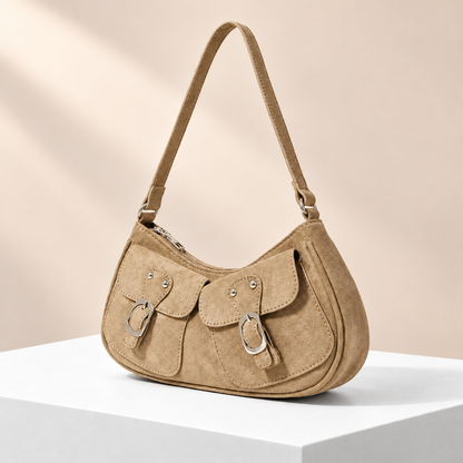 Velmora Pocket Shoulder Bag — white plinth, warm beige background