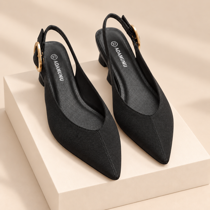 Aveline Pointed-Toe Slingback Flats — warm beige studio background