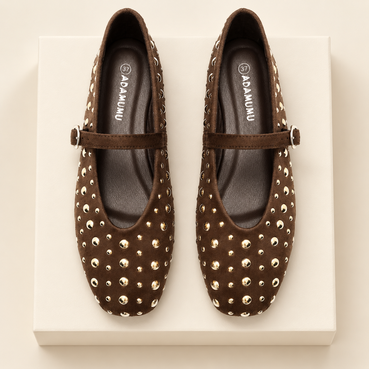 Aurevia Gold-Tone Studded Mary Jane Flats — ivory studio gallery photograph