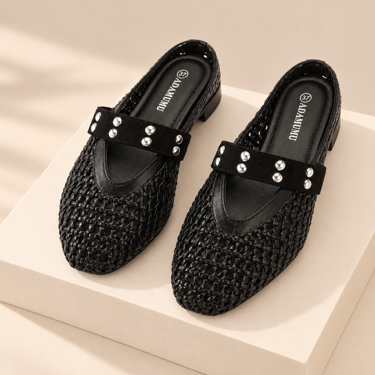 Solmira Woven Studded-Strap Mary Jane Flats — warm beige studio background