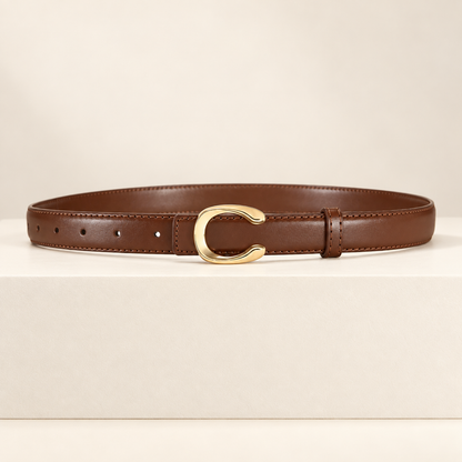 Céliane Letter Buckle Belt — ivory studio gallery photograph