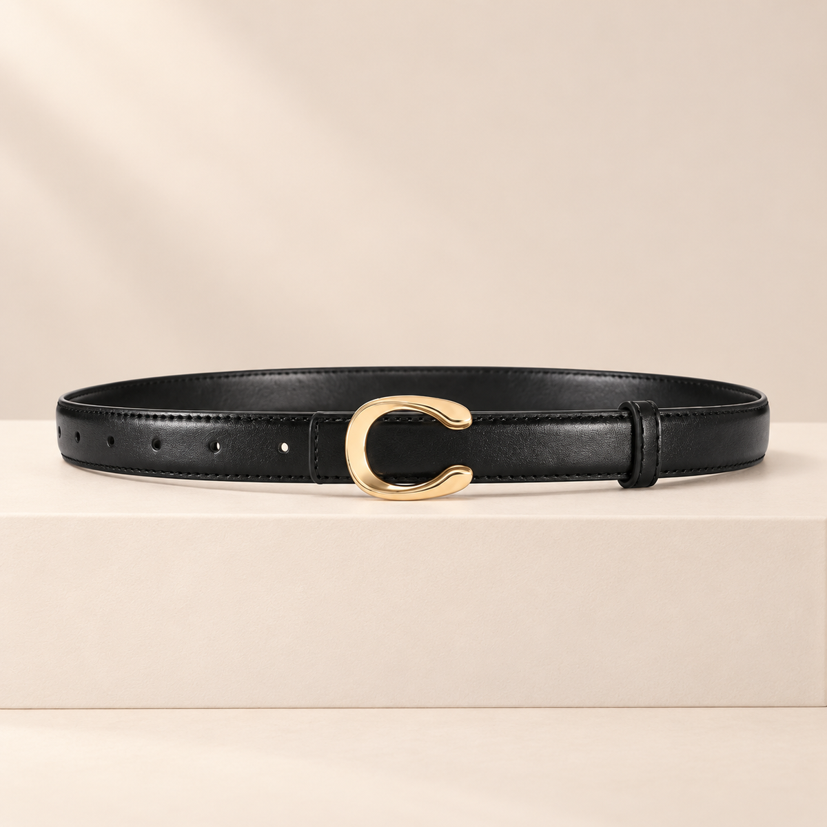 Céliane Letter Buckle Belt — studio product photograph