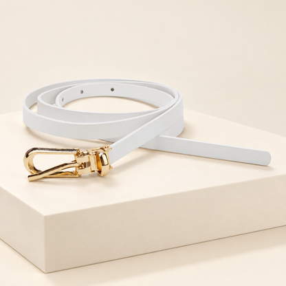Elowra Sculpted Buckle Skinny Belt — ivory studio gallery photograph