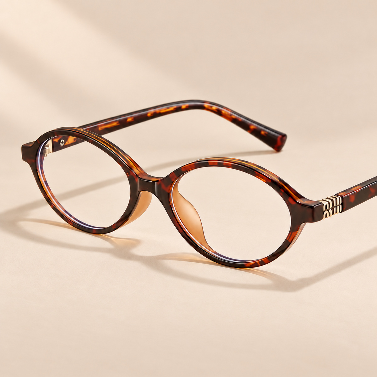 Elowen Retro Oval Reading Glasses — warm beige studio background