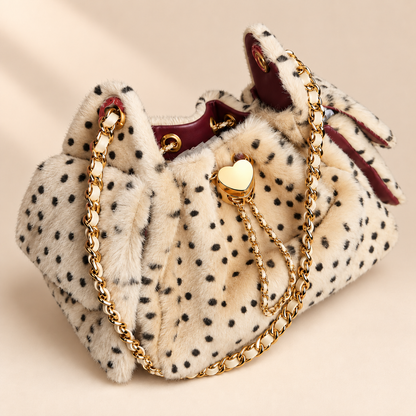 Leopelle Fluffy Leopard Crossbody Bag — warm beige studio background