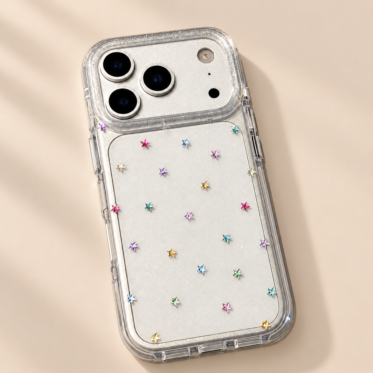 Stellara Glitter Star Transparent iPhone Case — warm beige studio background