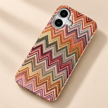 Virelle Brown Chevron Glossy iPhone Case — warm beige studio background
