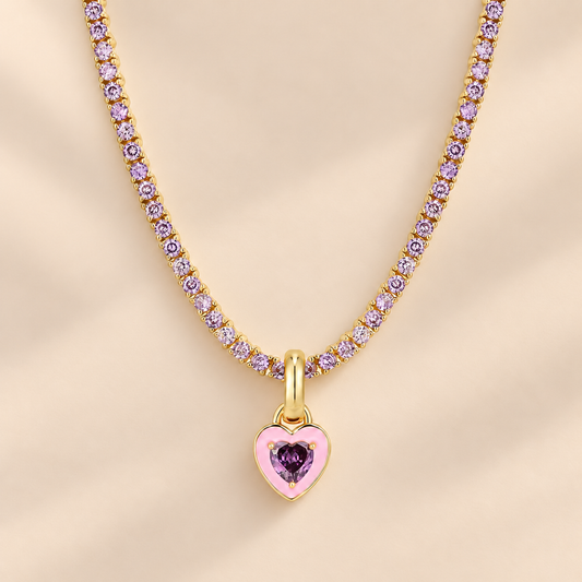 Emerelle Heart Tennis Chain Necklace — warm beige studio background