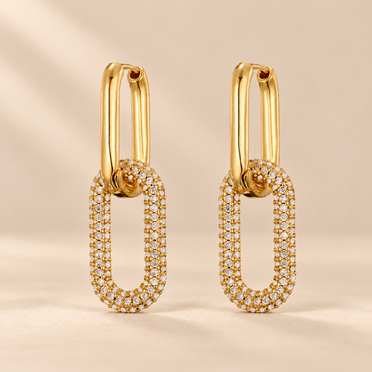 Avelisse Geometric Zircon Hoop Earrings — warm beige studio background